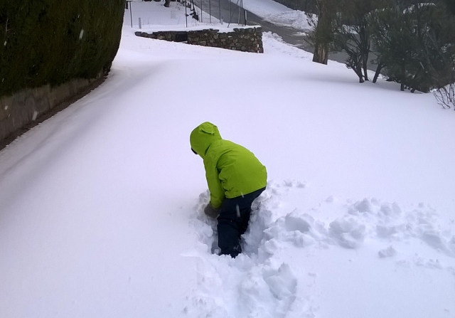 Digging a trench thru the white stuff.